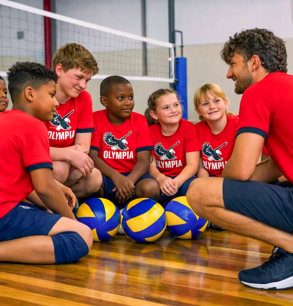 Allenatori e atleti Olympia in palestra
